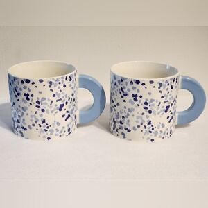 Room Essentials brand mugs featuring a blue and white speckled pattern Set Of 2